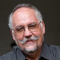 Dr. Tom Bloomer, Reitor Internacional, Universidade das Nações
